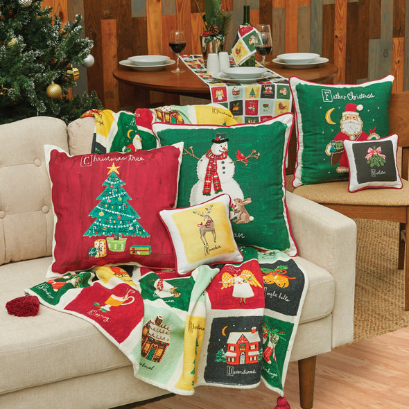 Alphabet Christmas collection featuring throw pillows and tabletop decor.
