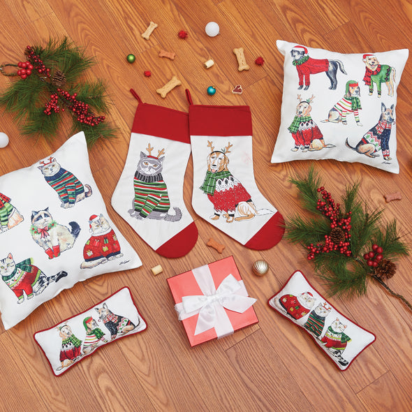 Flatlay image of the Pet Christmas collection featuring coordinating 22x22 pillows, gift pillows, and stockings.
