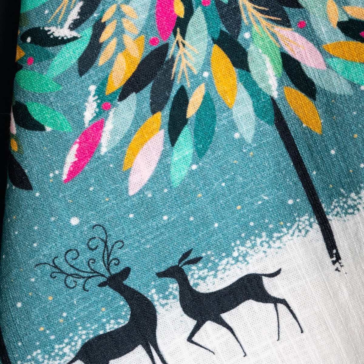 A festive forest screen printed towel.