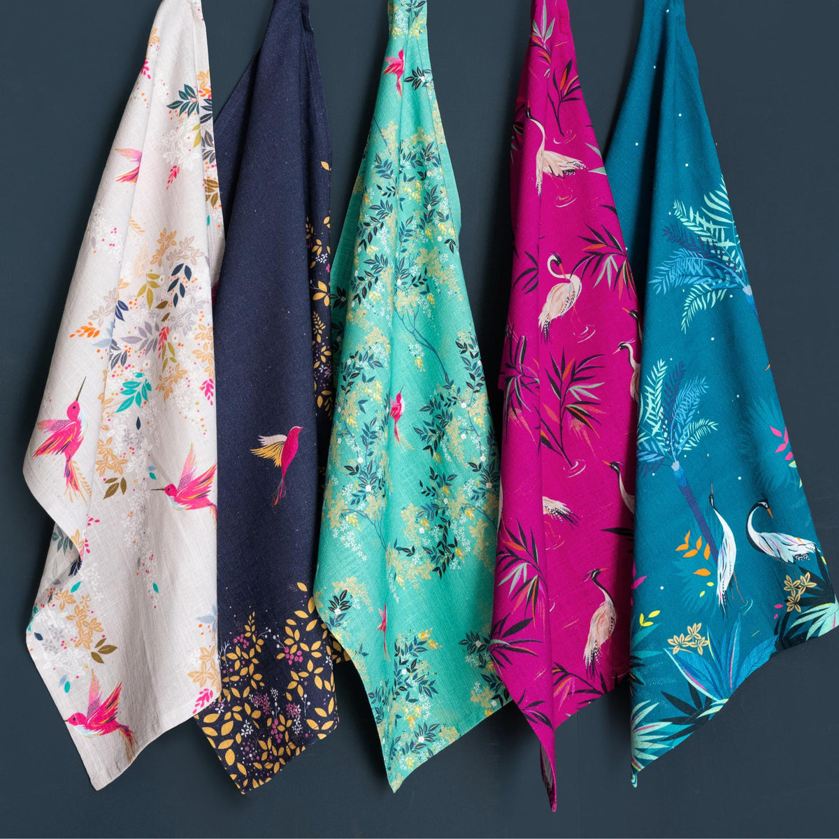 A teal heron screen printed towel.