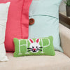 bunny hop hooked mini pillow on a couch with a blue and pink pillow