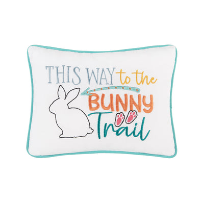 With a sweet Easter design embroidered in a colorful palette of teals, orange, and yellow. With the words "this way to the bunny trail" with a bunny icon, bunny feet as well as an arrow 