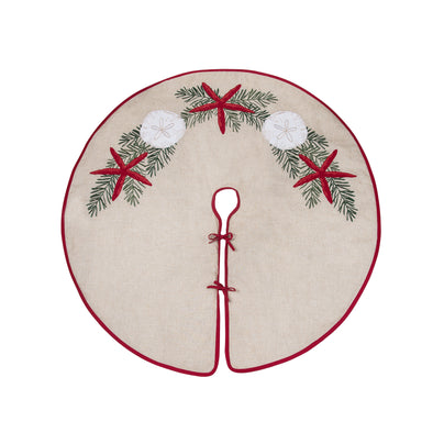 Seaside plaid Tree Skirt is tan trimmed with red with an accent of starfish, sand dollar and garland in the front 