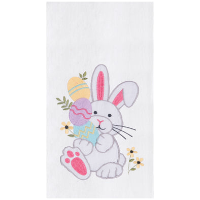 flour sack towel with an adorable bunny holding decorated easter eggs and surrounded by delicate flowers