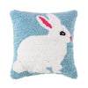 The Easter Bunny hooked pillow features a white rabbit against a blue background with a pom-pom tail.