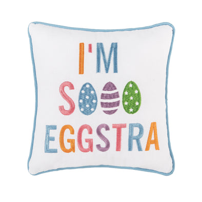 Embroidered with a colorful pastel palette with the words "I'm sooo eggstra"  and decorative Easter Eggs in the "ooo" of the sooo with blue piping around the edges