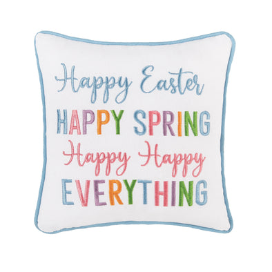 Embroidered with a colorful pastel palette saying "happy easter happy spring Happy Happy Everything" A fun mix of bold and whimsical fonts stand out against the white ground. Finished with a blue piped border,
