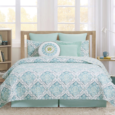 blue and grey medallion quilt set that reverses to a coordinating all over medallion pattern in yellow and grey