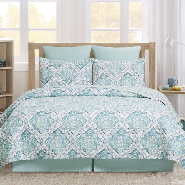 blue and grey medallion quilt set that reverses to a coordinating all over medallion pattern in yellow and grey