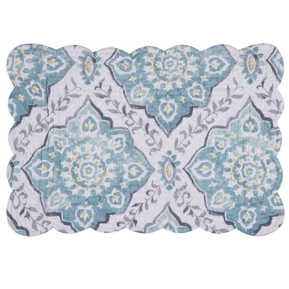 quilted table linens featuring blue and grey medallion pattern with pops of yellow that reverse to a coordinating repeating medallion pattern in grey and yellow