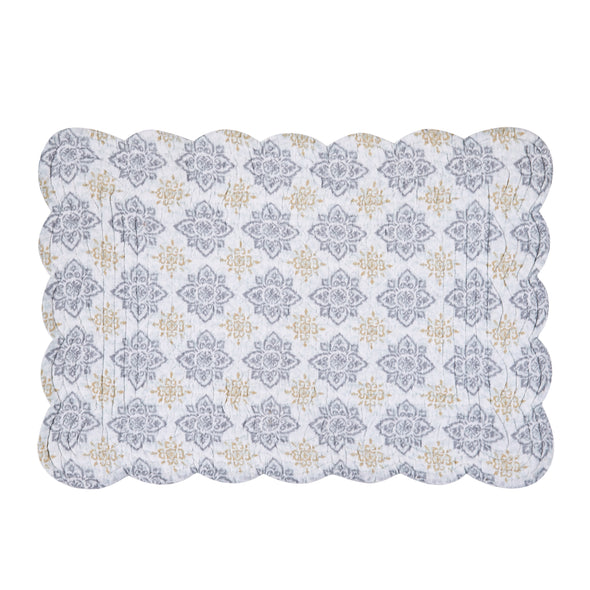 quilted table linens featuring blue and grey medallion pattern with pops of yellow that reverse to a coordinating repeating medallion pattern in grey and yellow