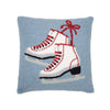 hooked pillow with white ice skates and red laces on a light blue background