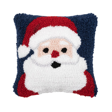 hooked pillow with Santa's face and bright red hat on a navy blue background. Santa has a bright red nose.