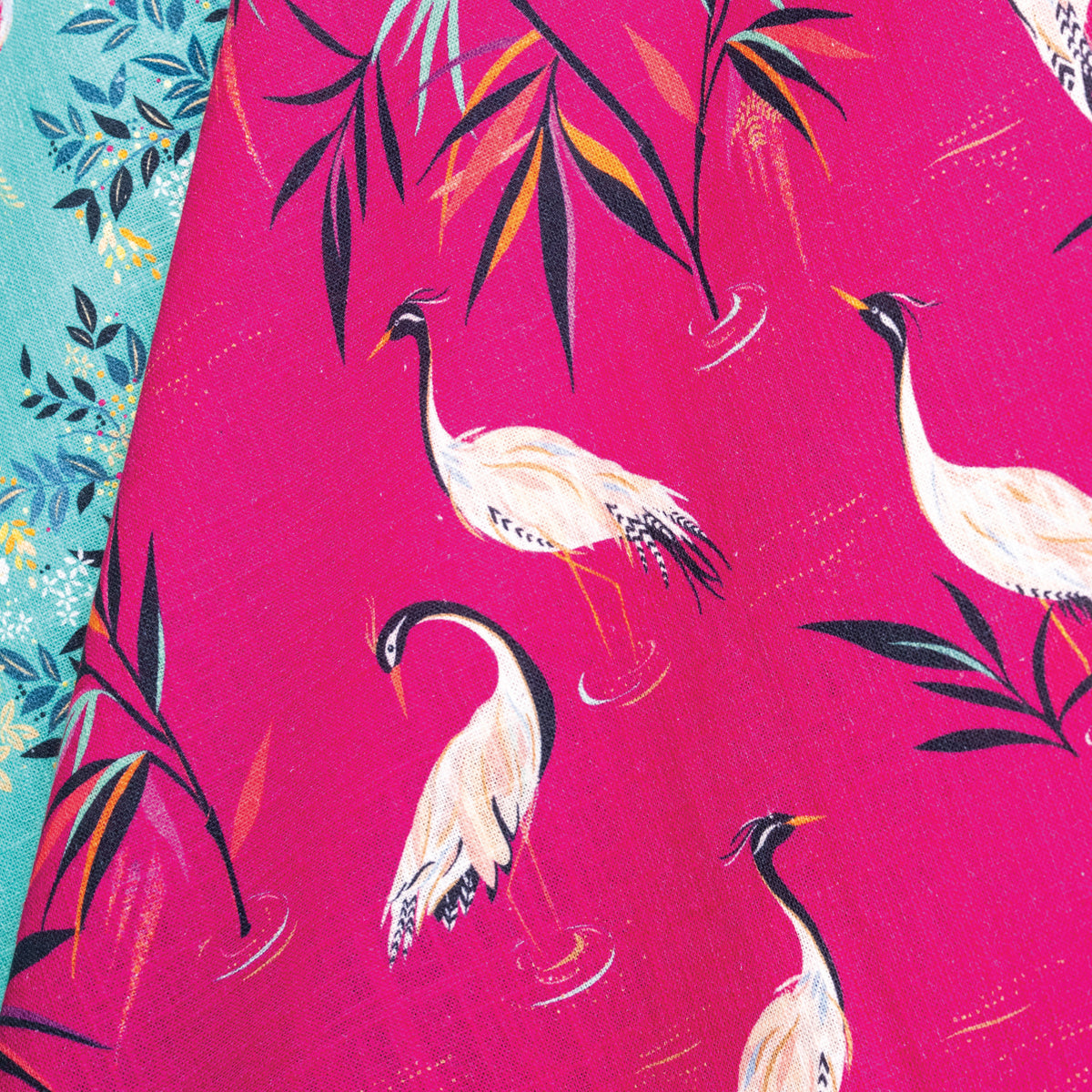 A pink crane screen printed towel.
