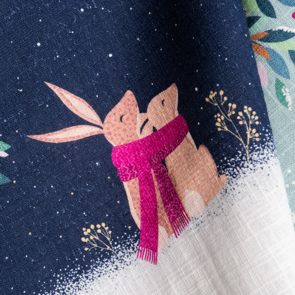 A moonlit rabbits screen printed towel.