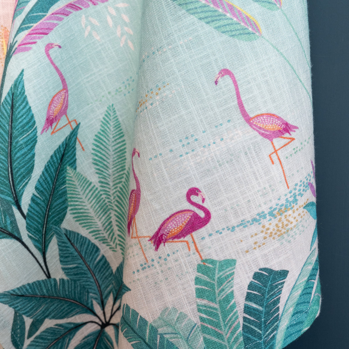 A flamingo palms screen printed towel.