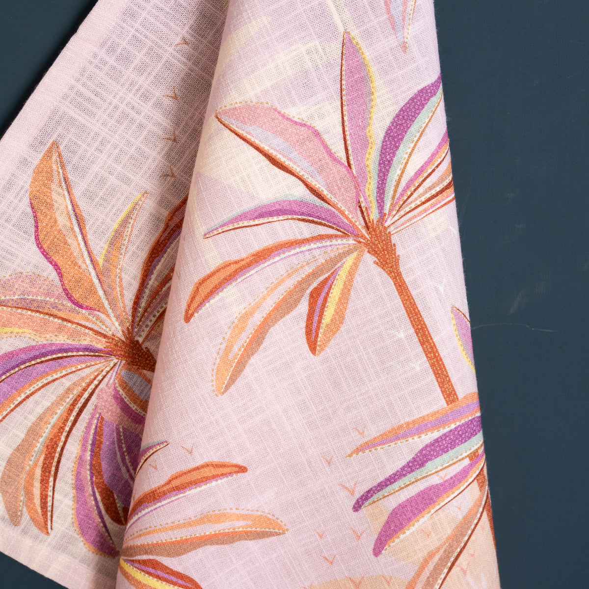 A pink palms screen printed towel.