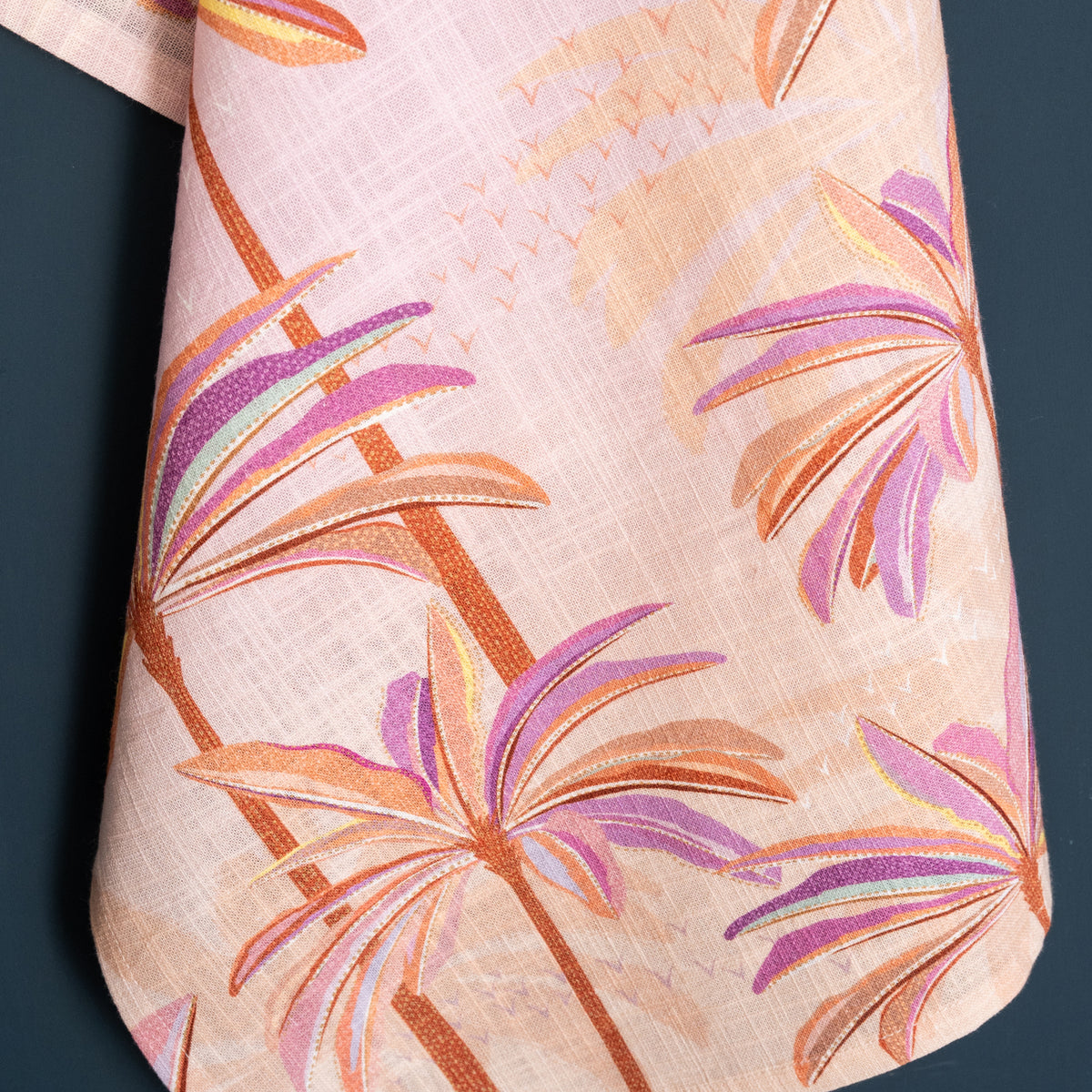 A pink palms screen printed towel.