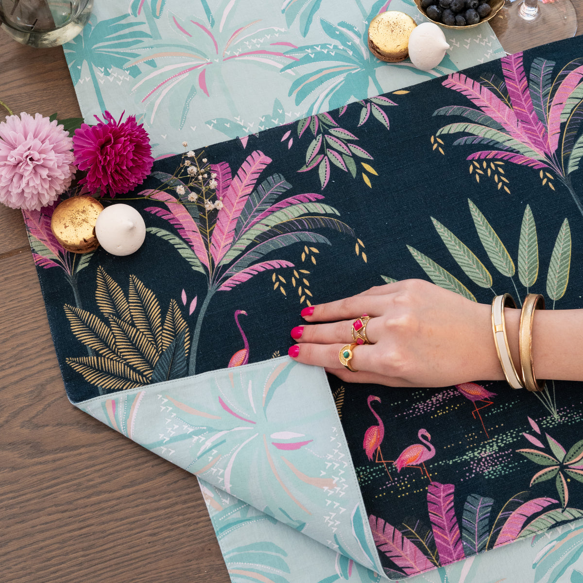flamingo palms table linens table linens displayed as a coordinated tabletop setting.