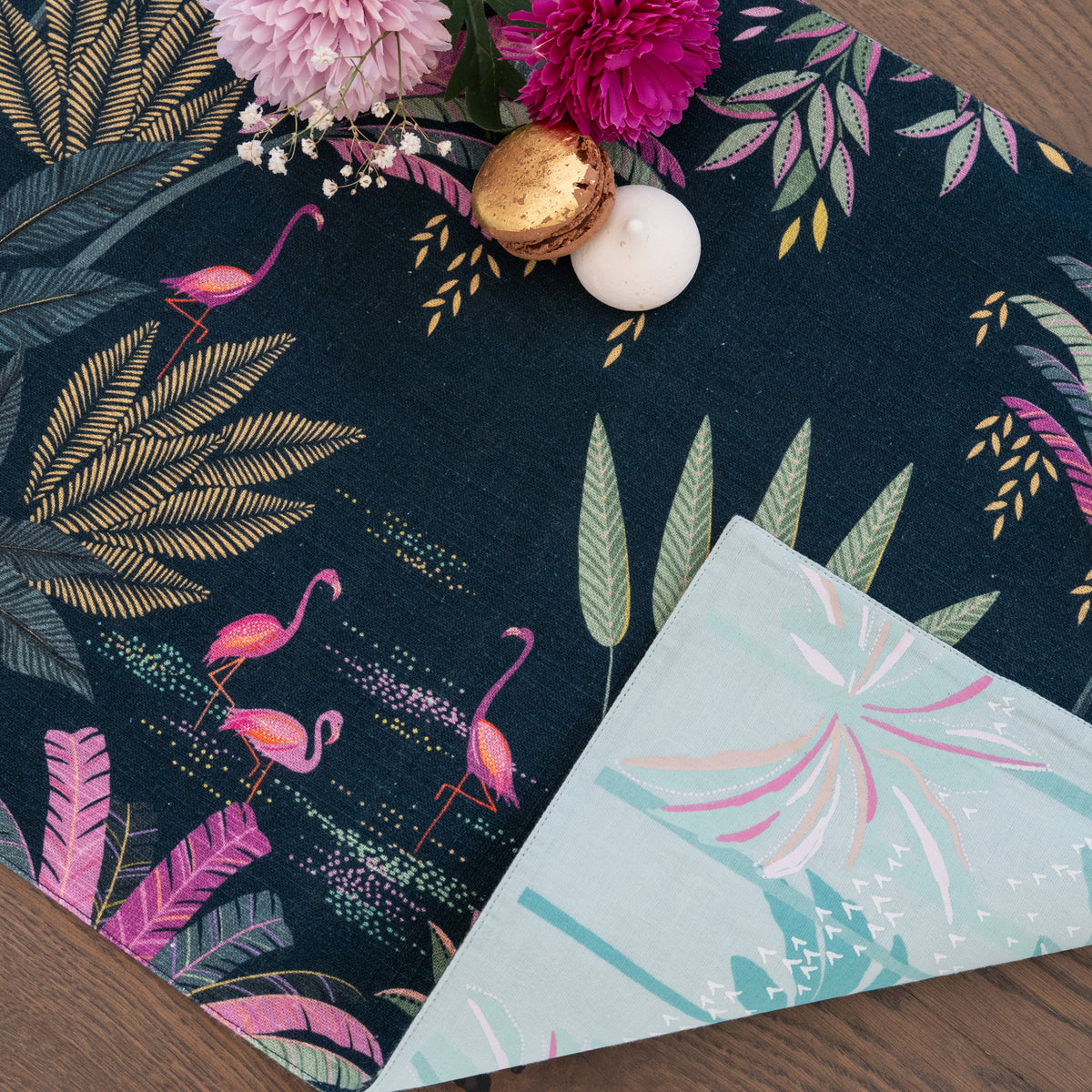 flamingo palms table linens table linens displayed as a coordinated tabletop setting.