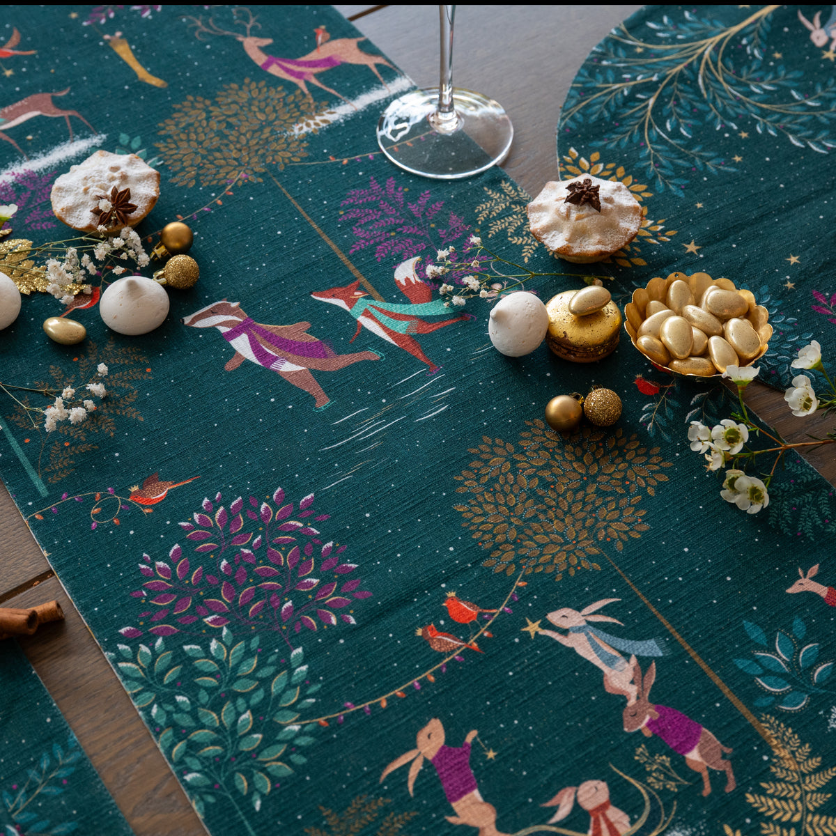 woodland tales table linens table linens displayed as a coordinated tabletop setting.