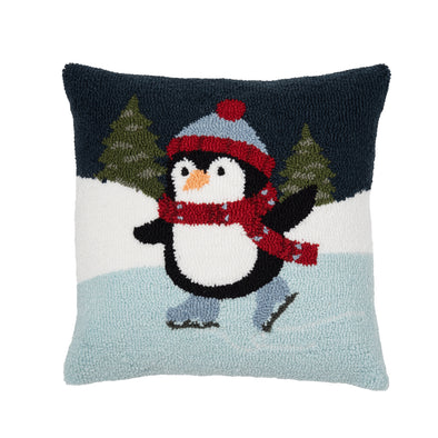 hooked pillow with a penguin dressed in winter clothing ice skating in the wintertime