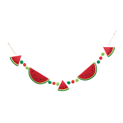 polyester garland of watermelon slices and colorful pom poms in a bright red, pink, and green color palette