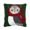 hooked pillow depicting an owl wearing earmuffs and a scarf on a green background