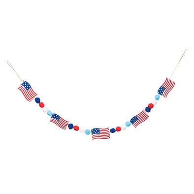 american flag icons alternate in a garland with red blue and white pom pom ball decorations