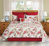 Averie Quilted Bedding Set styled with holiday pillow accessories.