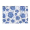 white placemat with blue sunflowers in a variety of sizes