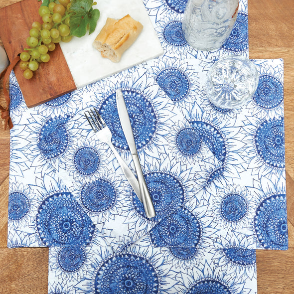 blue harvest sunflower table linens set on a table with bread and grapes