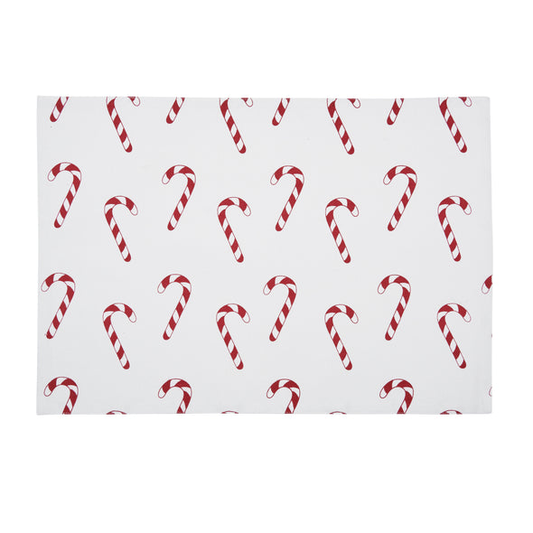 printed placemat with red and white candy canes on a white background