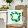 clover wreath pillow on a chair