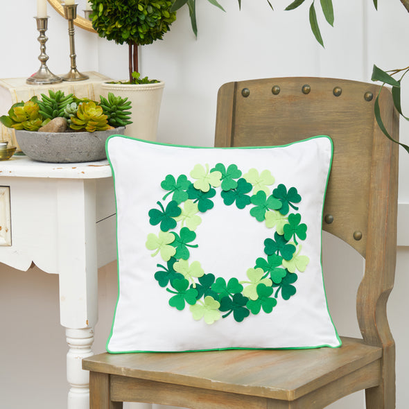 clover wreath pillow on a chair