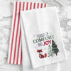 waffle weave towel with the words tidings of comfort and joy above a fox and christmas trees on a marble countertop