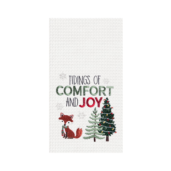 waffle weave towel with the words tidings of comfort and joy above a fox and christmas trees