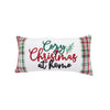 tufted and embroidered design with the phrase cozy christmas at home in a cursive font on a white background. the edges have a red green and white plaid pattern