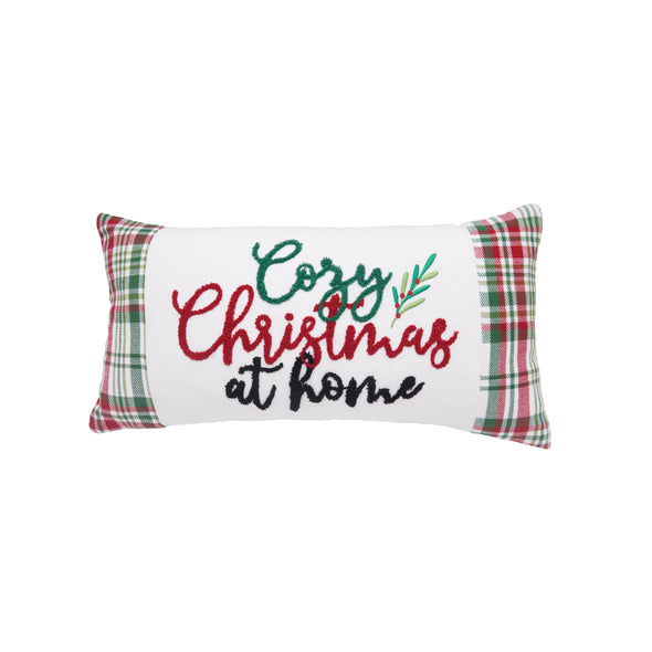 tufted and embroidered design with the phrase cozy christmas at home in a cursive font on a white background. the edges have a red green and white plaid pattern