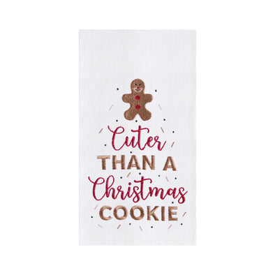 embroidered flour sack towel with a gingerbread man cookie on top and the phrase cuter than a Christmas cookie below in different fonts