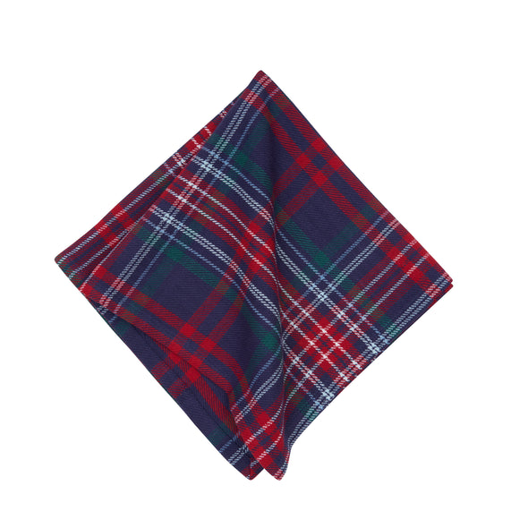 woven napkin featuring a navy blue green red and white plaid pattern