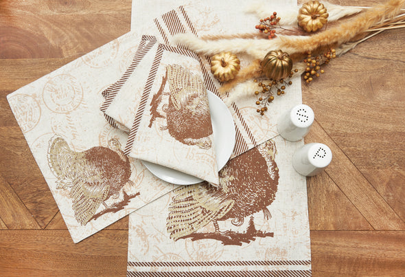 Elegant Turkey Table Linen styled together with serve ware and centerpiece.