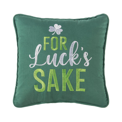 green pillow with the words "for luck's sake" in green and white with a clover at the top
