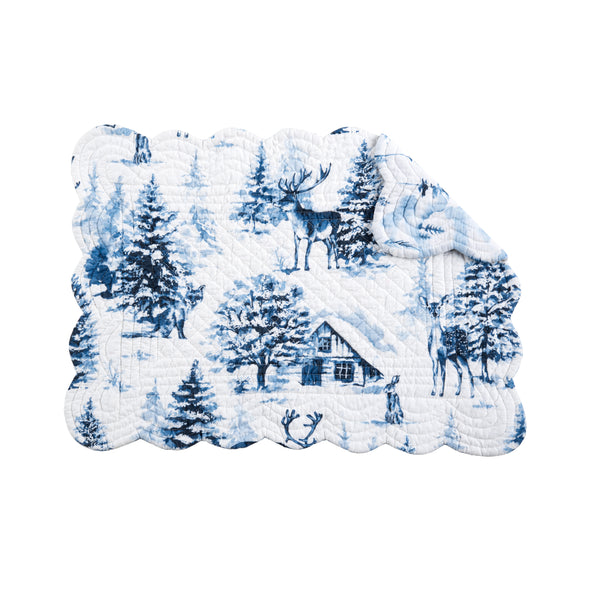 quilted placemat with a blue watercolor inspired forest scene