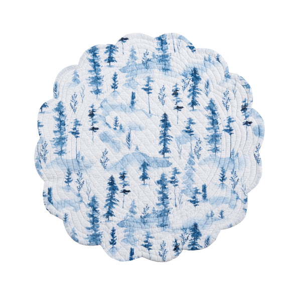 quilted round placemat with a blue watercolor inspired forest scene