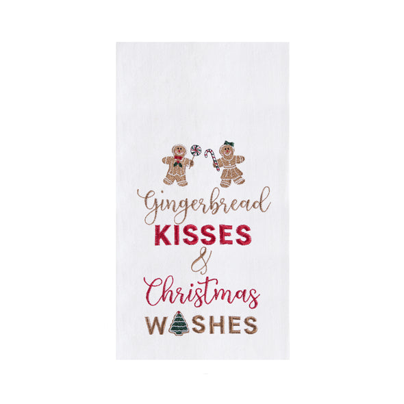 embroidered flour sack towel with the phrase gingerbread kisses and Christmas wishes below a gingerbread man and gingerbread woman