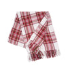 red and white woven throw with tassel edges