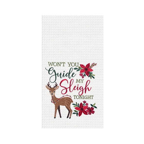 waffle weave towel with the phrase won't you guide my sleigh tonight in different font styles nestled between an adorable reindeer and red flower arrangements