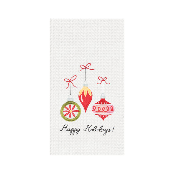 Happy holidays ornament waffle weave kitchen towel, three red and green ornaments with happy holidays on a white towel
