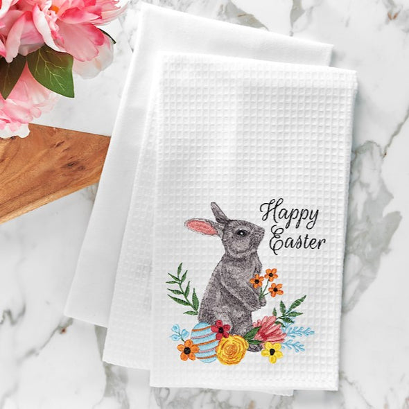 happy easter bunny kitchen towel on a counter